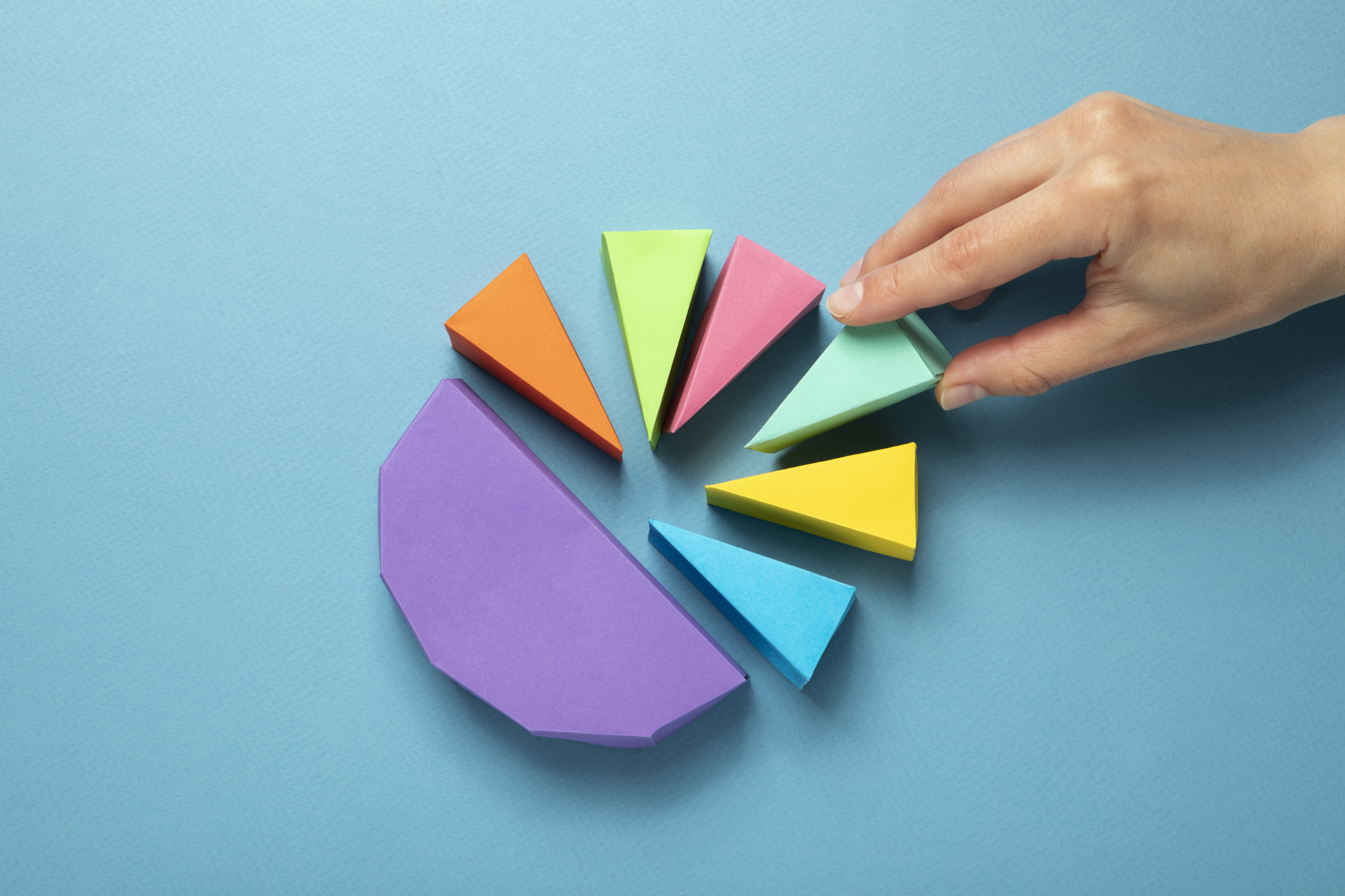 top-view-hand-taking-slice